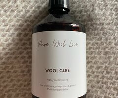 Wolwasmiddel